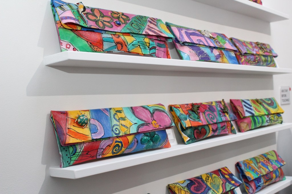 Susan Tancer painted clutch bags, GraySpace Gallery exhibition, curated by Rhonda P. Hill, photo courtesy of GraySpace Gallery
